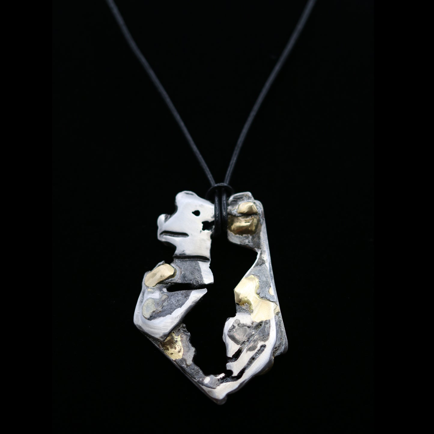 HALFHUMAN ORIGINALS Stainless Steel and Brass Pendant on Cord